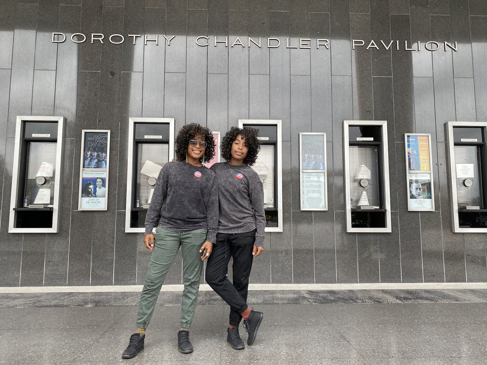 Twins Rachel and Gabrielle Newman in front of the Dorothy Chandler Pavilion