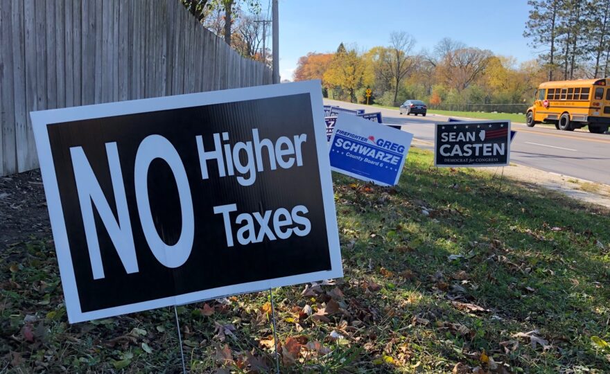 Political signs promoting no higher taxes