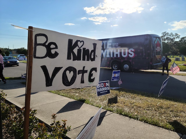 Sign reading "Be Kind, Vote"