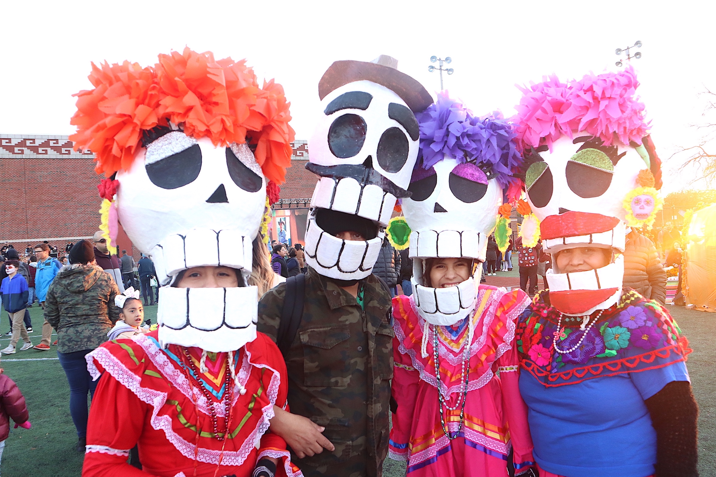 group of attendees dressed as calaveras