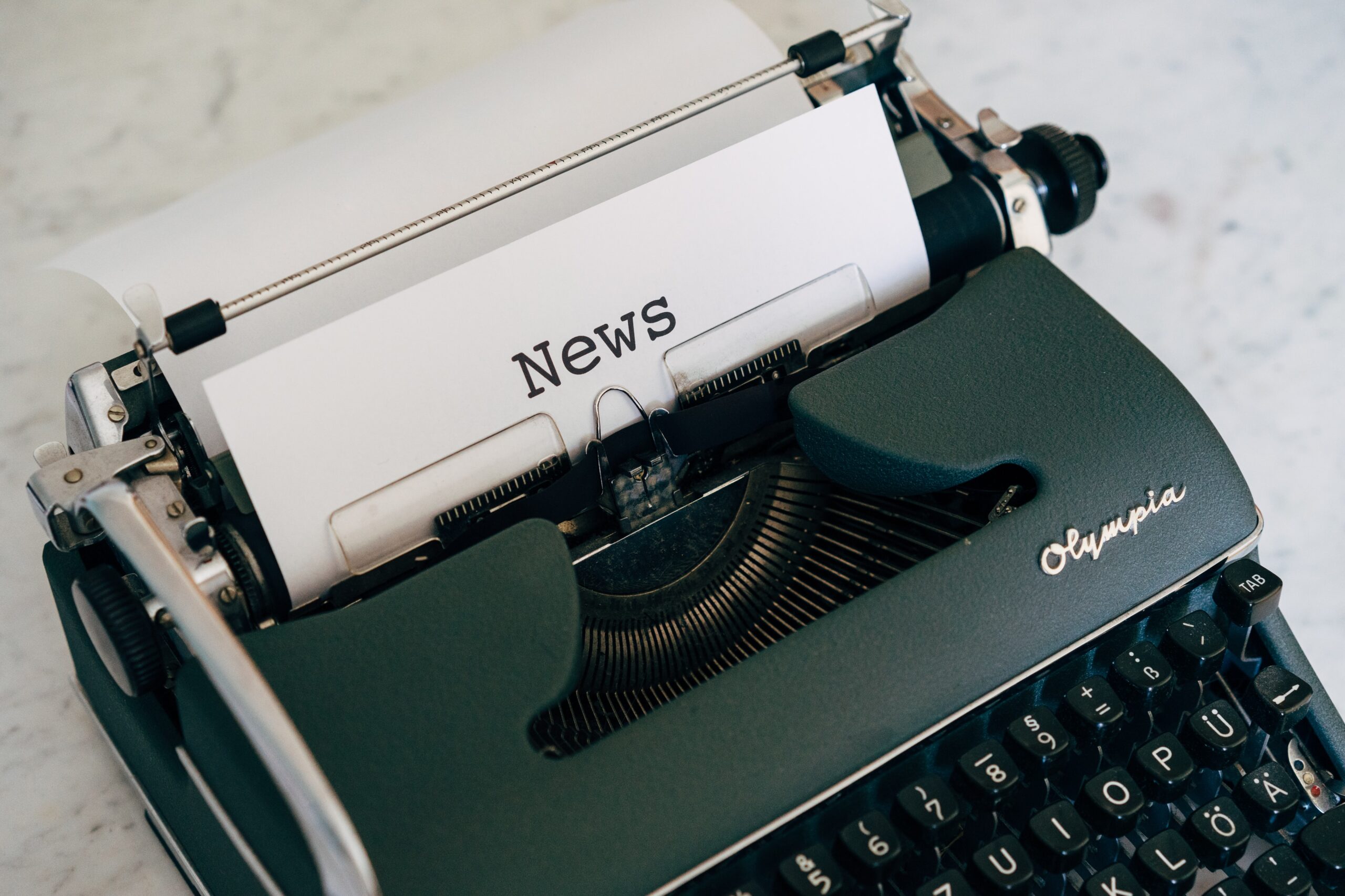 Typewriter with news on it