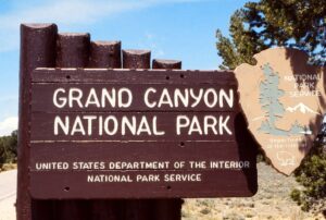 Sign reading "Grand Canyon National Park" circa 1976