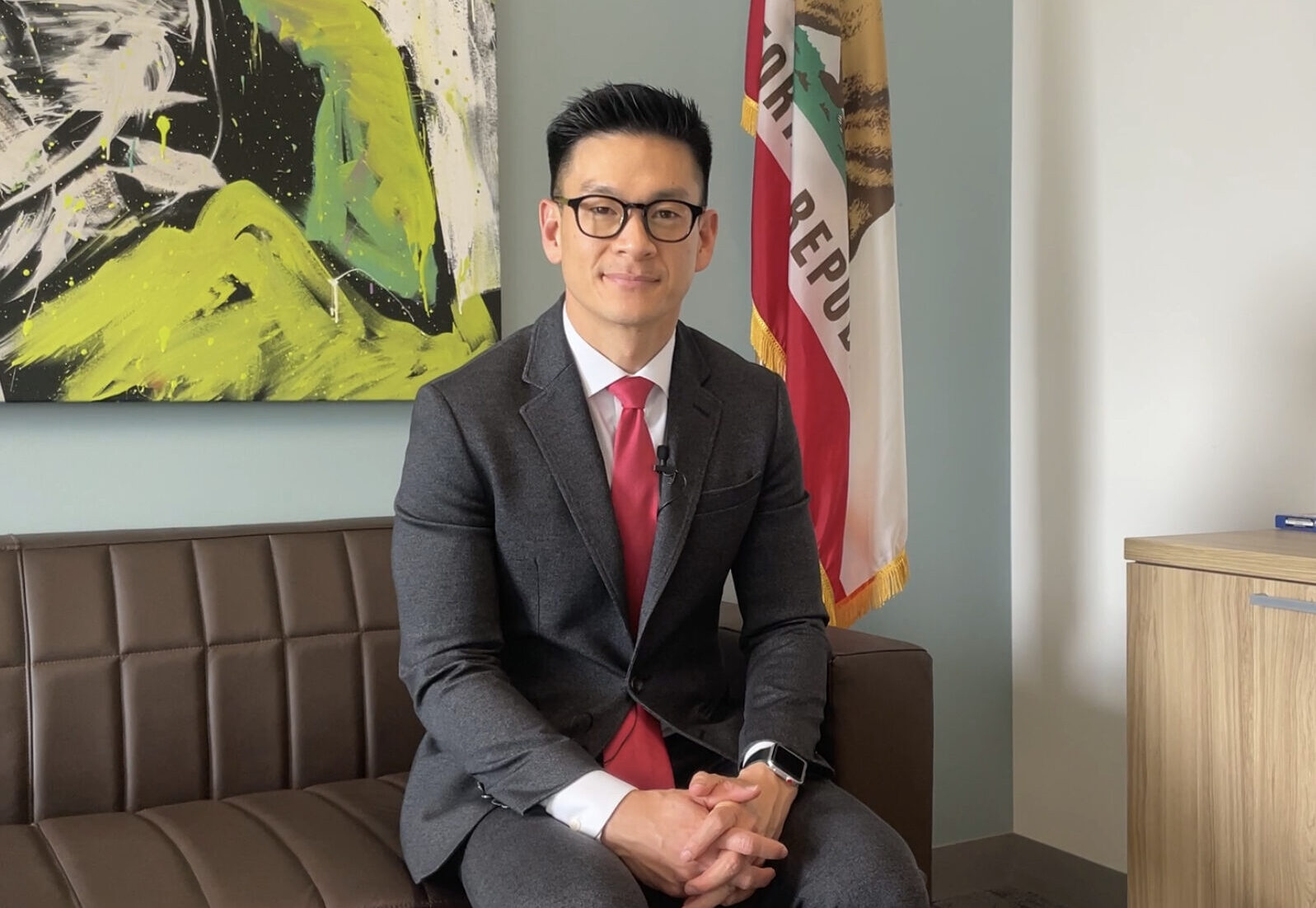 California Assemblymember Evan Low sits in office at State Capitol.