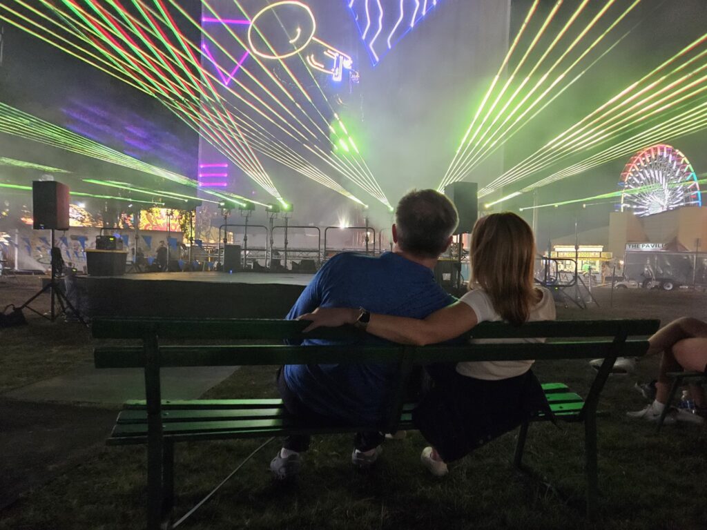 couple enjoys laser show at the fair