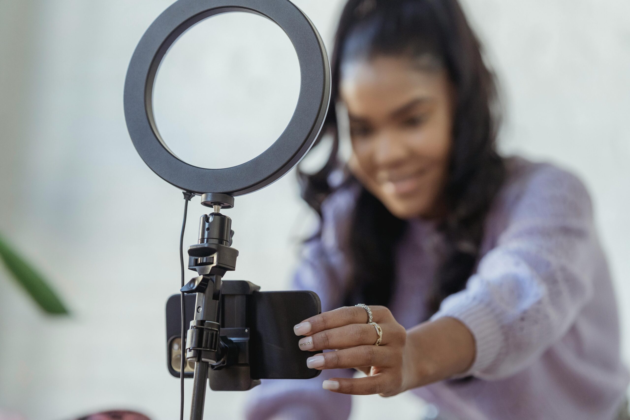 Woman setting up a camera