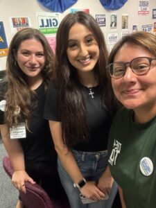 Organizing director Francesa Adams, The Click reporter Valeria Garcia, and City Council Candidate Connie Gutierrez pose for a selfie