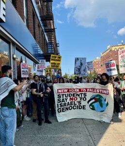 Protestors in front of the U.S. Army Recruitment Center