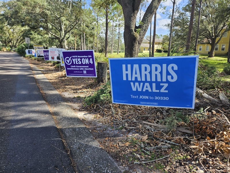 Yard signs for Harris-Walz and Florida's Amendment 4 on abortion