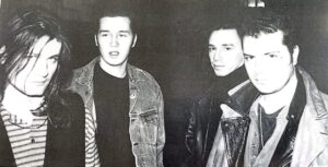 A black and white photo of the young Sway members posing