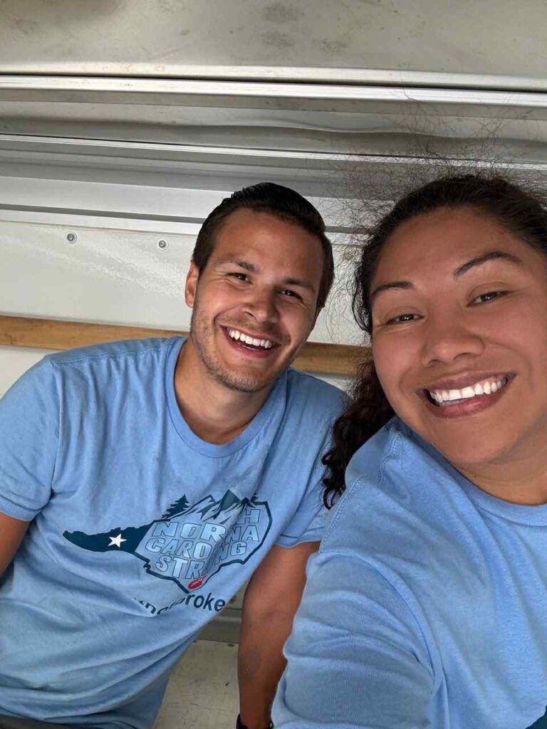 Carlos Foster and Sandra Aguirre smiling