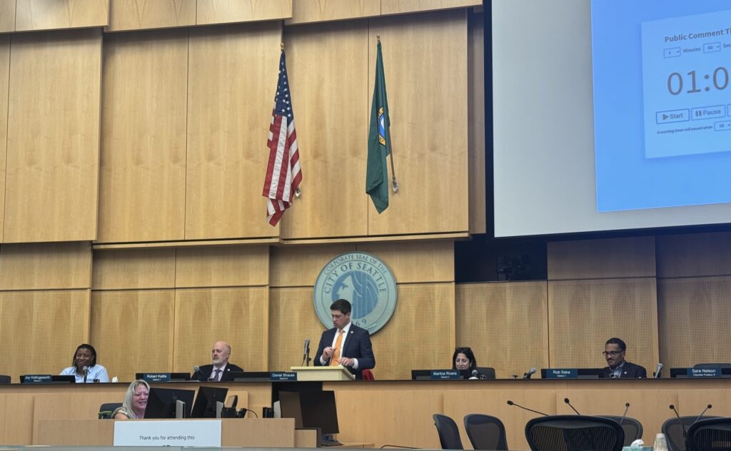 City council members sit facing the community
