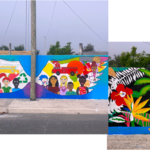 “They asked me to do wings,” said artist Hilary Mangel. “I included in my wings, many things that they requested for the community, for example, basketball. They have a basketball court just right down the road that everybody goes to. I have a firefighter in there. I have some animals like a rooster and a chameleon. I have different people with different colors. I have a doctor. I have a nurse. I have flowers. I have a pencil. … Recycling, they asked to have in there.
So, wings are meant to kind of encompass the community and to be interactive so that if people want to take a picture with it, there's a light pole right there. They stand up in front of the light pole, go across the street, take a picture. And then they have wings that, that are meant for their community.”
"I really enjoy painting flamingos. I paint them all the time and I did some kind of tropical flowers around it."
"I did a foliage painting with some flowers. There's a palm tree in the middle with a black background and they just wanted Florida plants. So that's what I did. They really are looking for people to really show what the community is about." Hilary Mangel's mural
