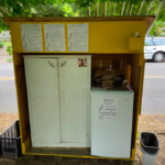 Free fridge on NE 7th, displaying community guidelines.
